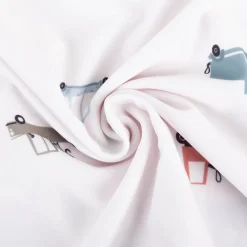 Badeanzugstoff UPF 50 bi-elastisch recycelt Baufahrzeuge wollweiß 1,50m Breite