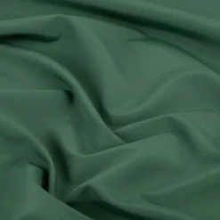 Badeshorts Stoff recycelt wasserabweisend schnell trocknend uni dunkelgrün 1,48m Breite