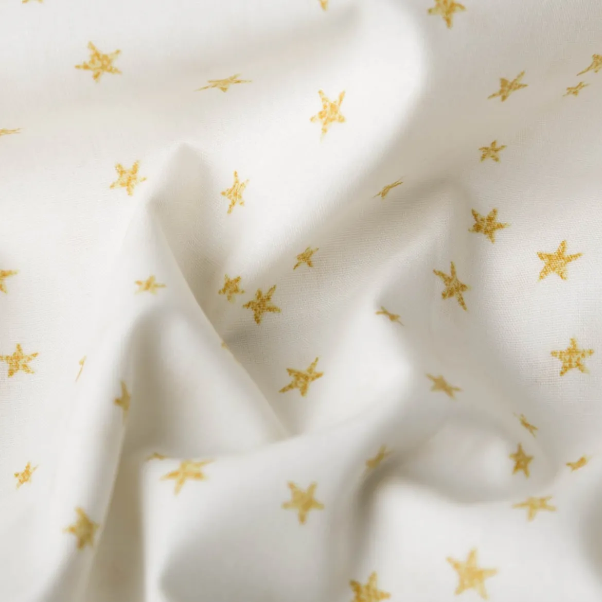 Baumwollstoff Webware Weihnachten Sterne creme goldfarbig 1,45m Breite