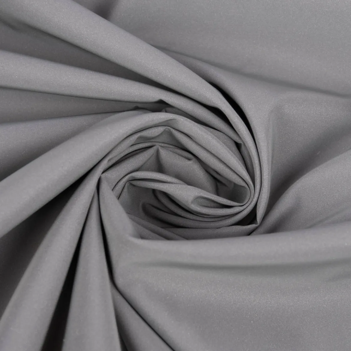 Bekleidungsstoff Polyester wasserabweisend reflektierend uni hellgrau 1,4m Breite