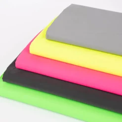 Bekleidungsstoff Polyester wasserabweisend reflektierend uni neon grün 1,4m Breite