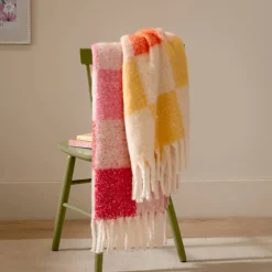 Überwurf Maisie Karo mit Quasten citrus blush rosé 130x180cm