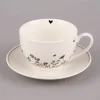 Clayre & Eef Tasse mit Untertasse Wiesenblumen Porzellan cremeweiß schwarz 200ml