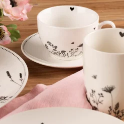 Clayre & Eef Tasse mit Untertasse Wiesenblumen Porzellan cremeweiß schwarz 200ml