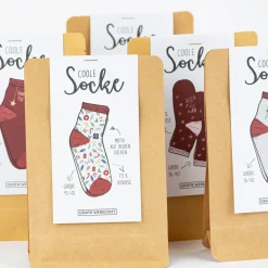 Coole Socke Weihnachten Frohes Fest Geschenke Tannenzweige Zuckerstangen beige bunt 41-45