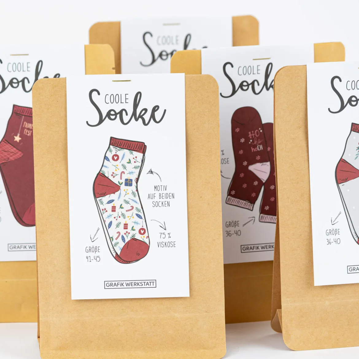Coole Socke Weihnachten Frohes Fest Geschenke Tannenzweige Zuckerstangen beige bunt 41-45