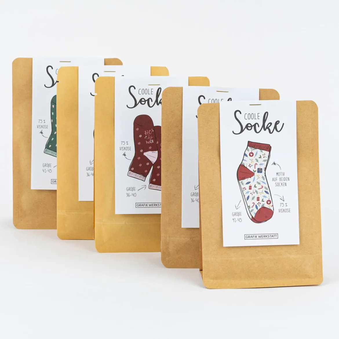 Coole Socke Weihnachten Frohes Fest Geschenke Tannenzweige Zuckerstangen beige bunt 41-45