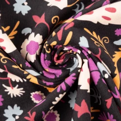 Cord Stoff Feincord Alio2 Blumen Blätter schwarz lila 1,4m Breite