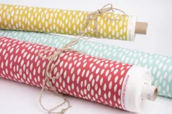 Dekostoff Bayside Honeydew rot mit Klecksen Tropfen 1,38m Breite