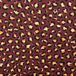 Dekostoff Halbpanama Leomuster Leoprint weinrot gold 1,40m Breite