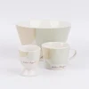 Eierbecher aus Porzellan Guten Appetit grafisch pastell weiß mint beige gold 5x6cm von der Schreibkram Manufaktur