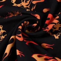 Faschingsstoff Polyester Totenköpfe Flammen schwarz orange 1,5m Breite
