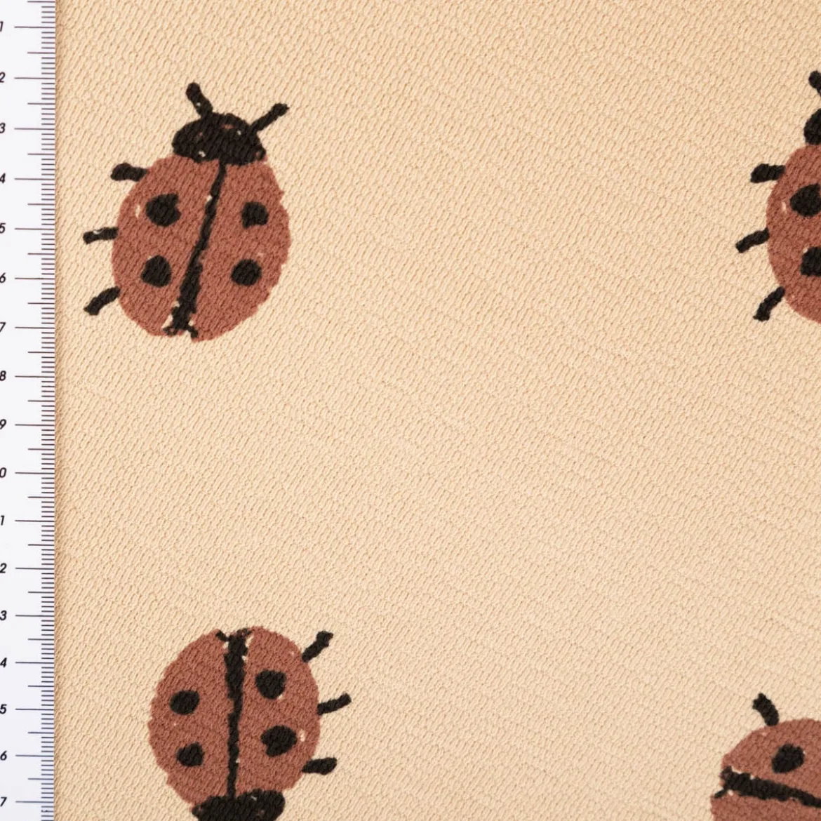 French Terry Krepp Stoff Baumwolle Marienkäfer beige rot 155cm