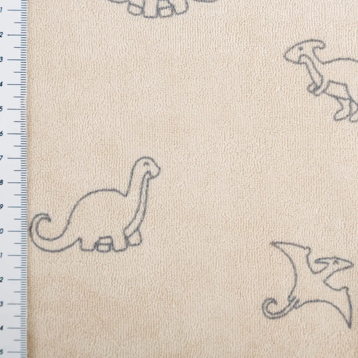 Frottee Stoff Stretch Dinosaurier beige 1,50m Breite