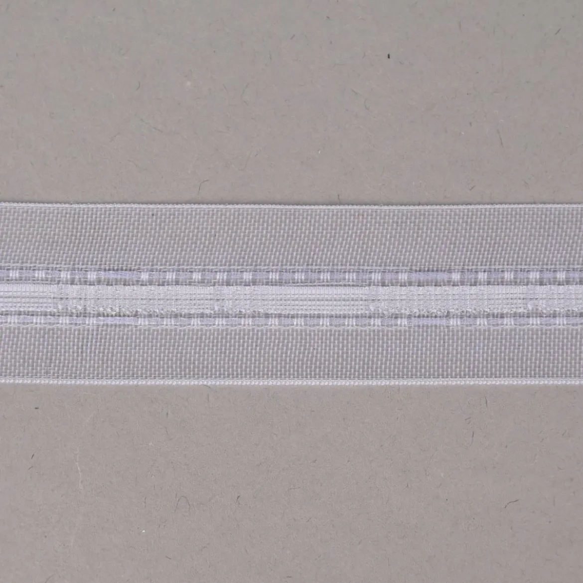 Gardinenband Universalband Falte an Falte 22mm transparent variabel mit transparenten Faden