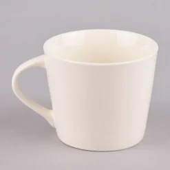 Grafik Werkstatt Goldtasse Frohe Ostern Blumenkranz weiß pastell goldfarbig 420ml