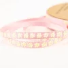 Gurtband Pfoten reflektierend rosa gelb 10mm Breite