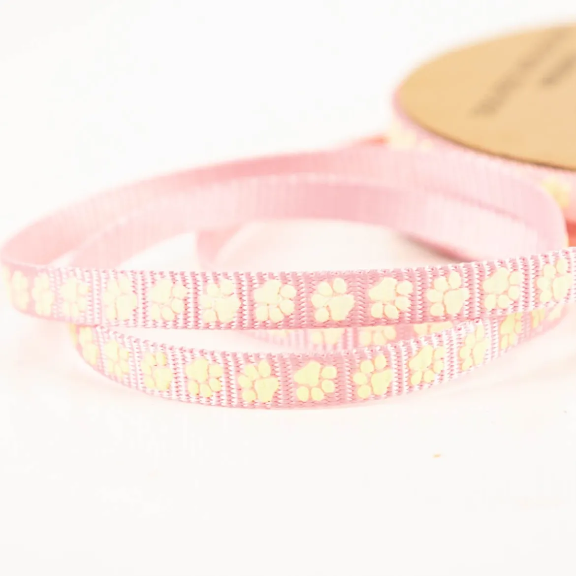 Gurtband Pfoten reflektierend rosa gelb 10mm Breite