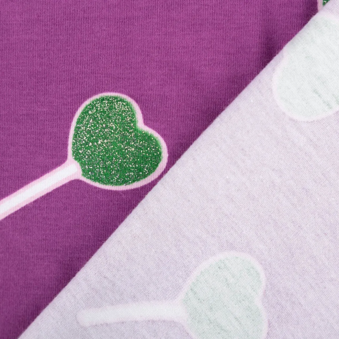 Jersey Stoff Baumwolljersey mit Glitter Lollypop lila grün 1,4m Breite