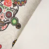 Kunstleder Lederimitat Totenköpfe geschmückt Blumen creme 1,4m Breite