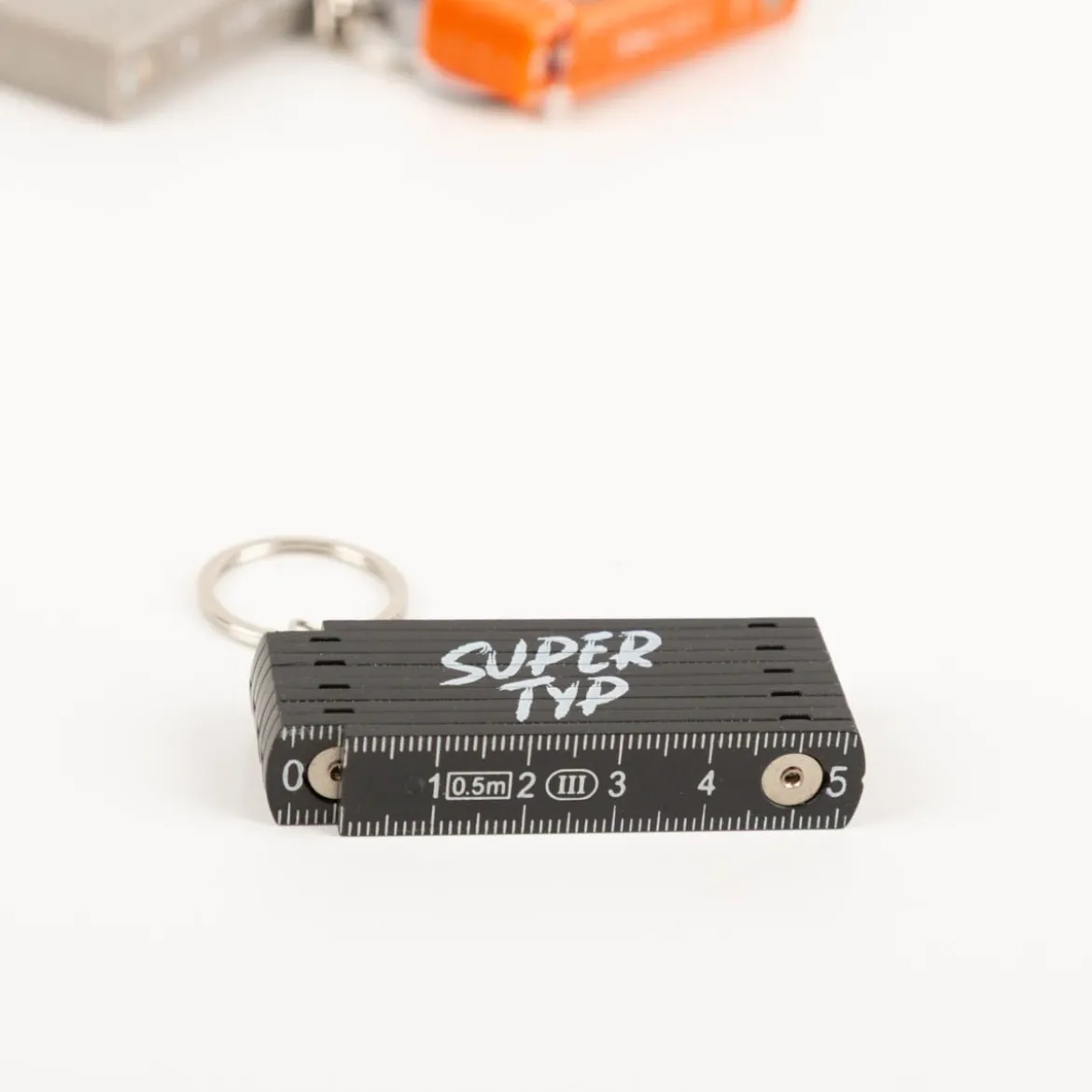 La Vida Mini-Zollstock Supertyp schwarz Schlüsselanhänger