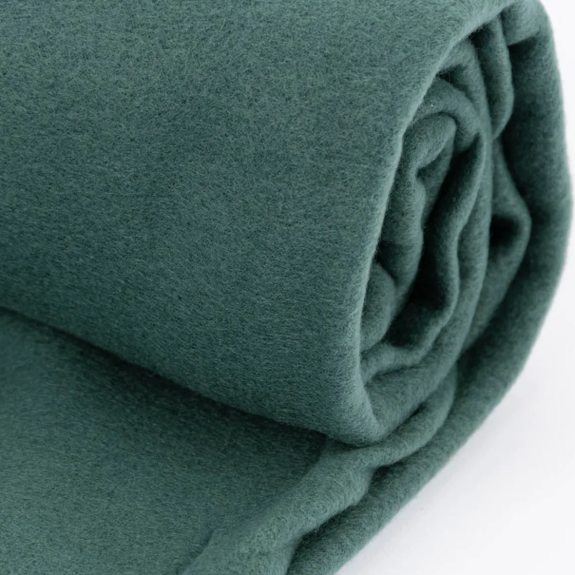 Plaid aus Polyester mit grobem Kettelrand einfarbig petrol 125x150cm