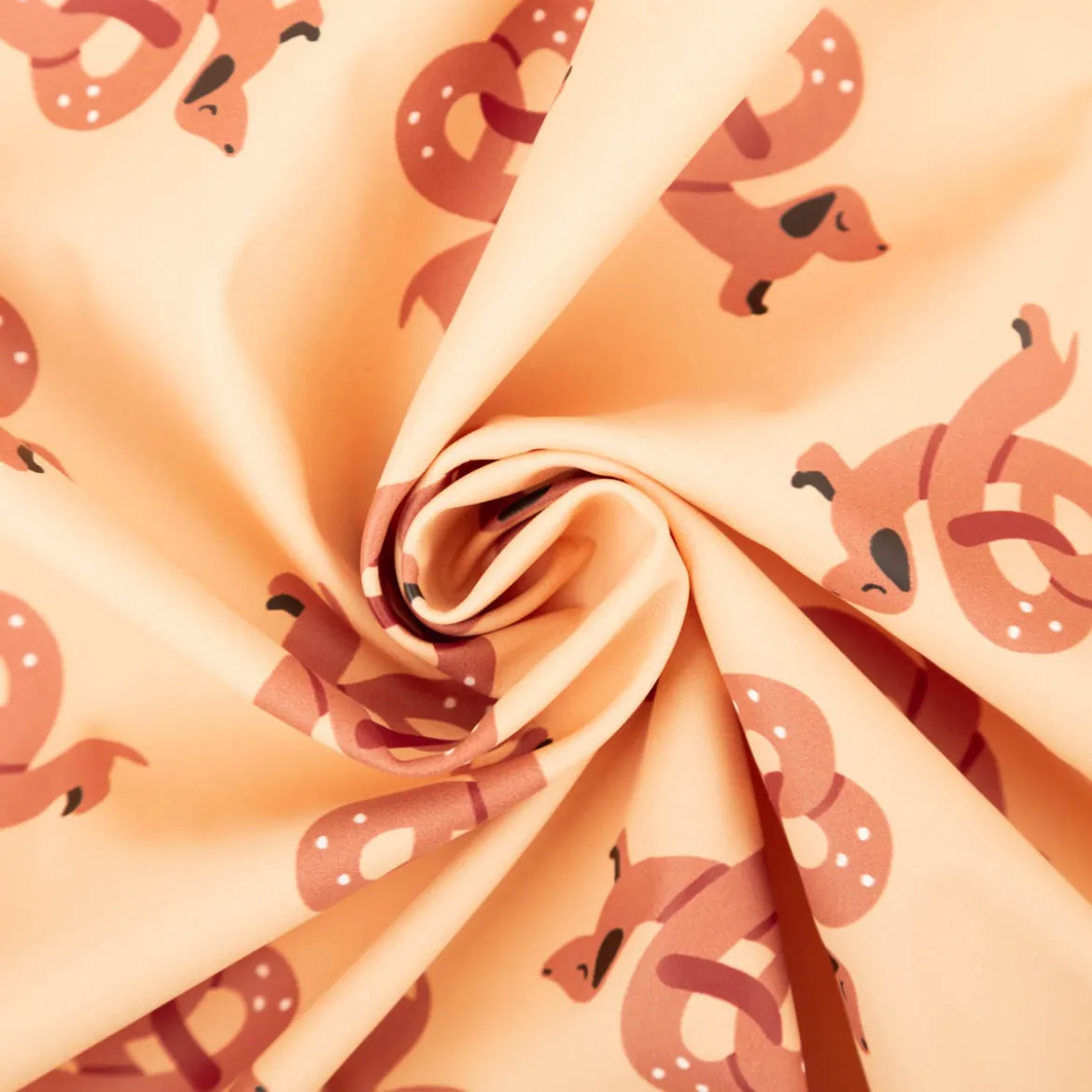 Polyester Stoff beschichtet wasserabweisend Alsachien Dackel Brezel beige karamell 1,40m Breite