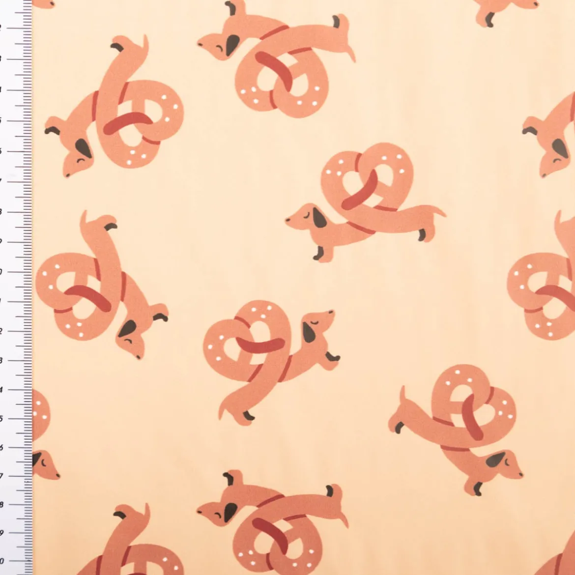 Polyester Stoff beschichtet wasserabweisend Alsachien Dackel Brezel beige karamell 1,40m Breite