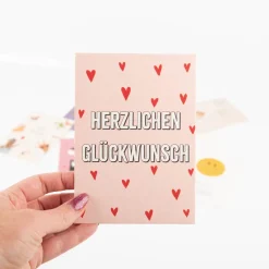 Postkarte Herzlichen Glückwunsch mit roten Herzen A6 von KEITCARDS