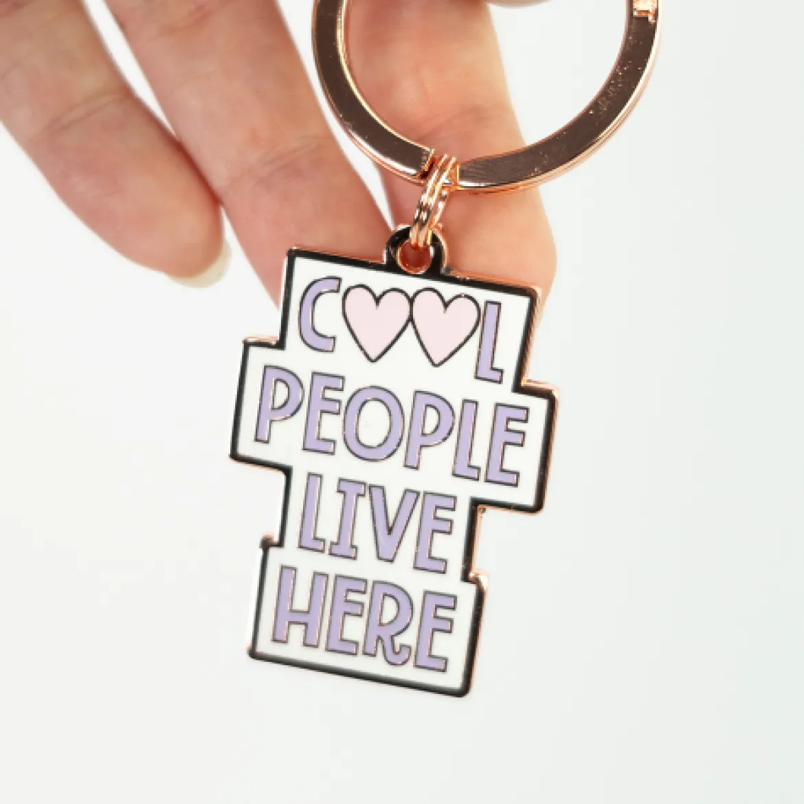 Schlüsselanhänger Cool people live here 85x40mm von Grafik Werkstatt