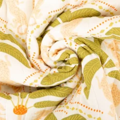 Steppstoff Musselin Stoff Wattierung Doubleface Palmen Panther wollweiß grün orange 1,30m Breite