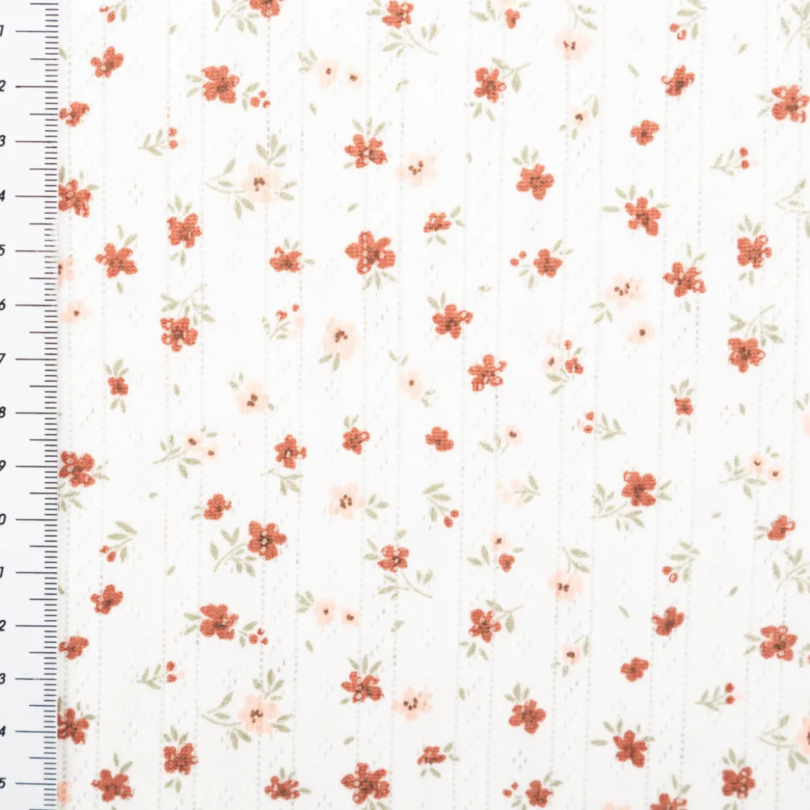 Strickstoff Ajour Pointelle Baumwolle mit Blümchen wollweiß 145 cm Breite