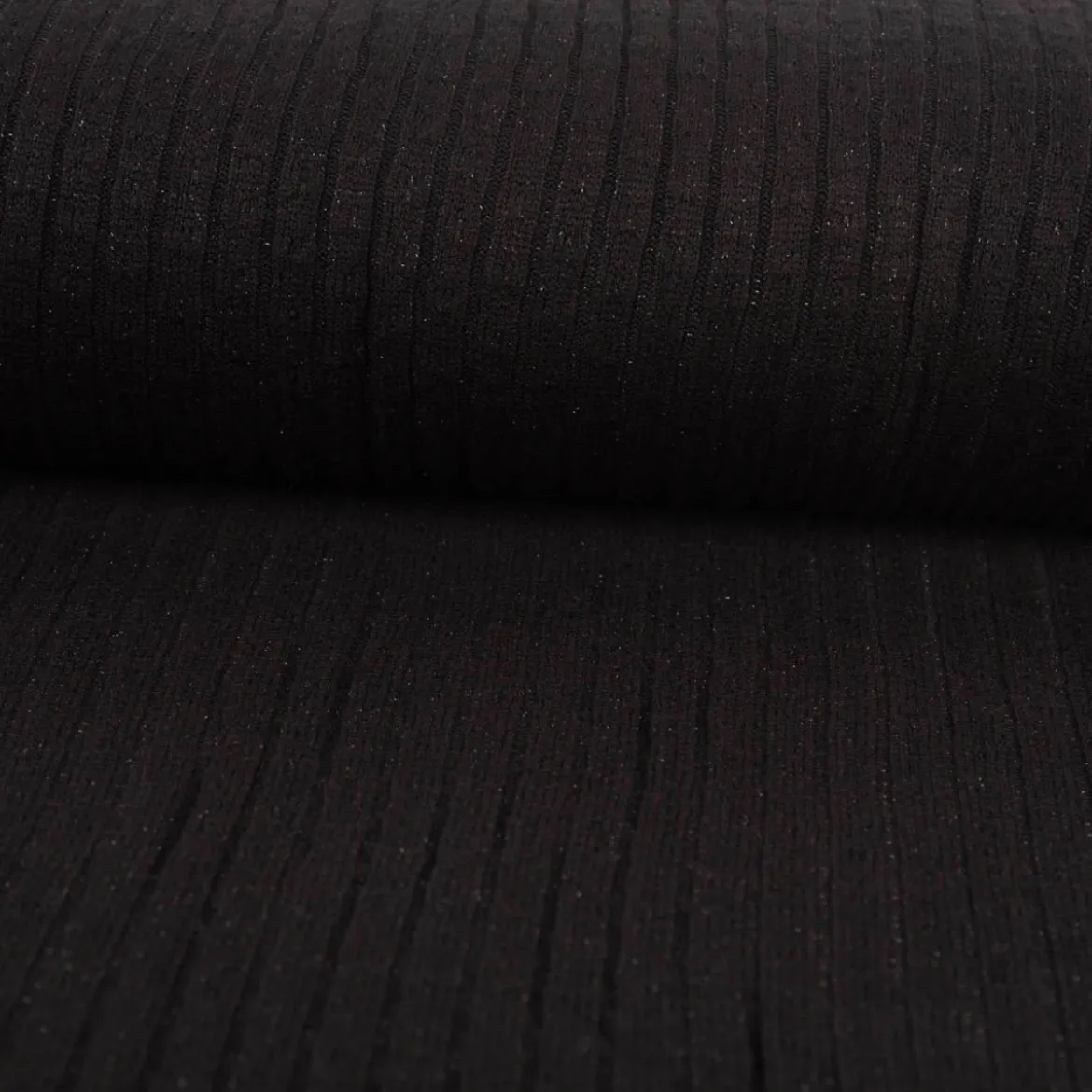 Strickstoff schwarz mit silberfarbigen Glitzereffekten 330g/qm 138cm Breite