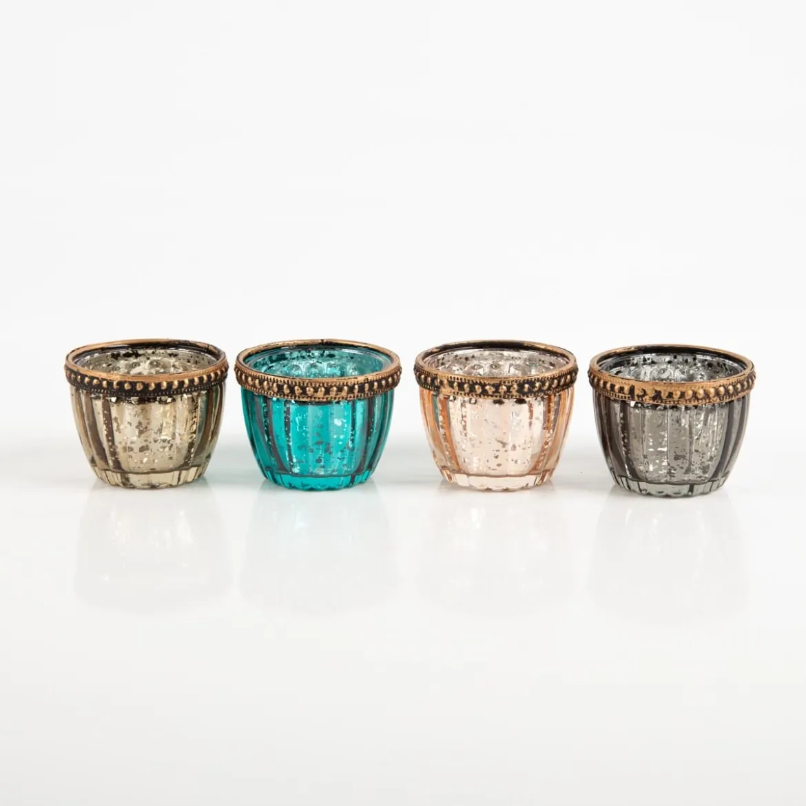 Teelicht mit Metallrand gerillt in vier Farben 4,5x6cm von Werner Voß
