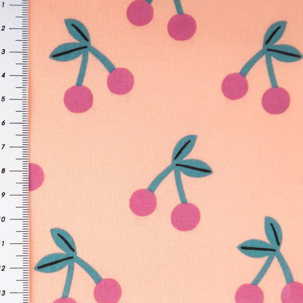 Tischdeckenstoff abwaschbar Baumwollstoff beschichtet Cherries Kirschen peach 1,45m Breite
