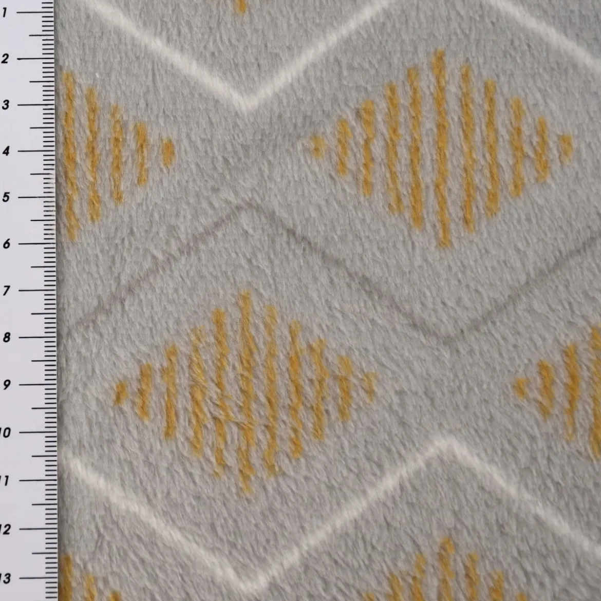 Wellness Fleece Geometrisch Rauten grau gelb weiß 1,5m Breite